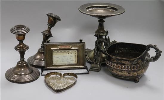 A silver mounted desk timepiece, a heart shaped trinket dish and four plated items